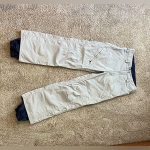 tan and navy blue burton snowboard pants